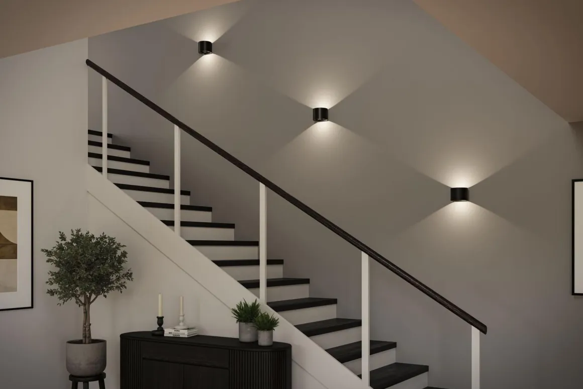 Nyara rund oppladbar vegglampe opp/ned lys med sensor